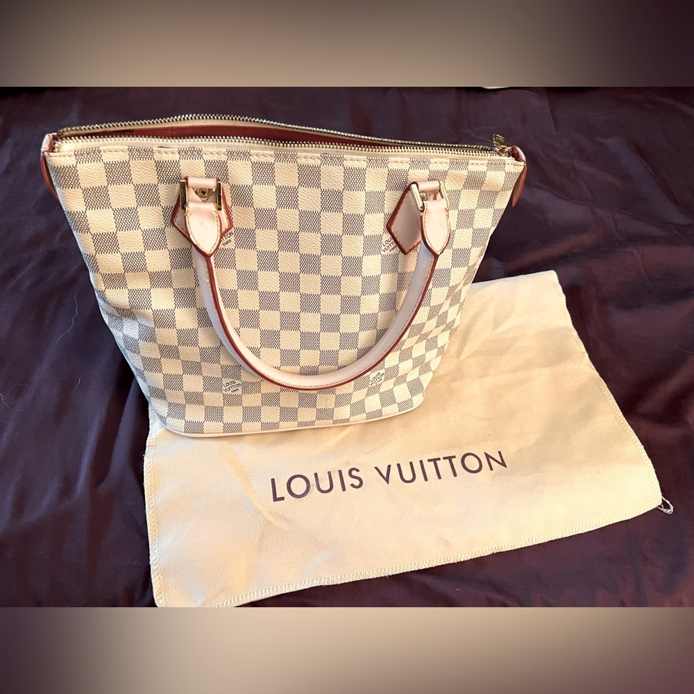 Louis Vuitton Saleya Handbag.